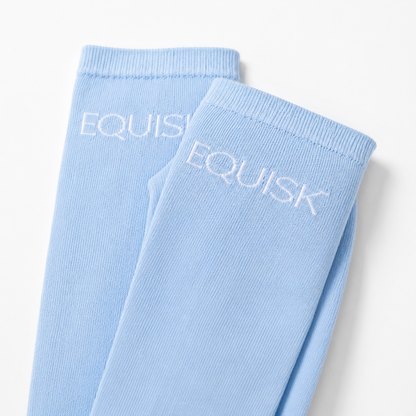Light blue socks with 'EQUISK' branding on a white background